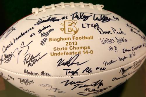 Al Hartmann  |  The Salt Lake Tribune
Bingham High School's 2013 state championship football is signed by the players.