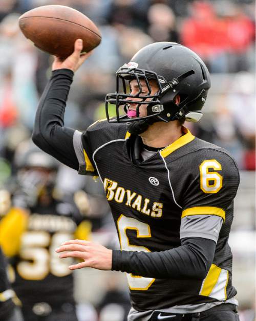 Trent Nelson  |  The Salt Lake Tribune
Roy's Tyler Skidmore passes the ball as Corner Canyon faces Roy High School in a  4A state football semifinal game at Rice-Eccles Stadium in Salt Lake City, Friday November 14, 2014.