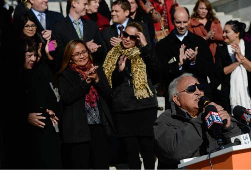 Francisco Kjolseth  |  The Salt Lake Tribune
Archie Archuleta, a long standing Latino figure in Salt Lake joins other Latino activists and families gathered on the South steps of the Utah Capitol on Friday, Nov. 21, 2014,  for a press conference to talk about President Obama's immigration executive order.