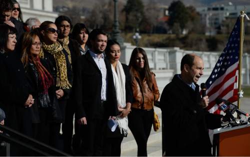 Francisco Kjolseth  |  The Salt Lake Tribune
Mark Alvarez takes to the podium as he joins Latino activists and families gathered on the South steps of the Utah Capitol on Friday, Nov. 21, 2014, for a press conference to talk about President Obama's immigration executive order.