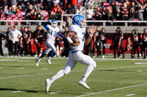 Trent Nelson  |  The Salt Lake Tribune
Dixie's Traton Miller (3) runs for a touchdown as Hurricane faces Dixie High School in the 3AA state championship game at Rice-Eccles Stadium in Salt Lake City Friday November 21, 2014.