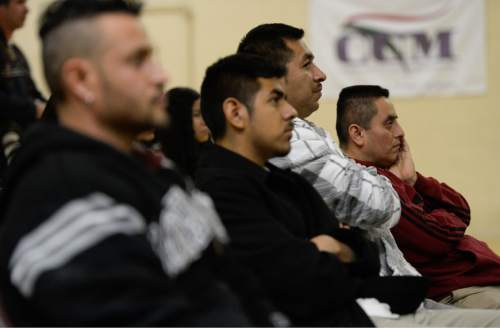 Francisco Kjolseth  |  The Salt Lake Tribune
Latinos gather at Centro Civico Mexicano to watch the live events from the White House during the historic announcement by  President Barack Obama to transform immigration policy and spare 5 million from deportation.