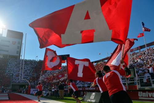 Chris Detrick  |  The Salt Lake Tribune
Utah cheerleaders celebrate a touchdown during the first half of the game against Idaho State Bengals at Rice-Eccles stadium Thursday August 28, 2014. Utah is winning the game 35-7.