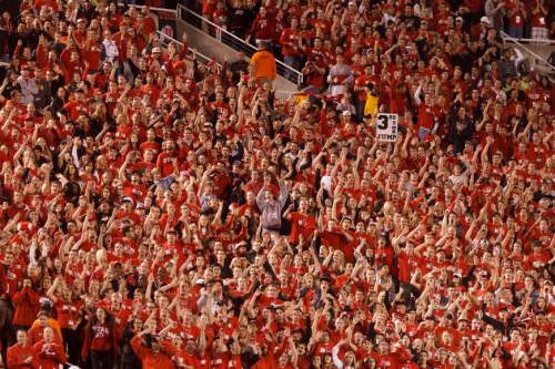 Trent Nelson  |  The Salt Lake Tribune
Utah fans in the MUSS cheer as Utah hosts USC, college football, Thursday October 4, 2012 at Rice-Eccles Stadium in Salt Lake City, Utah.