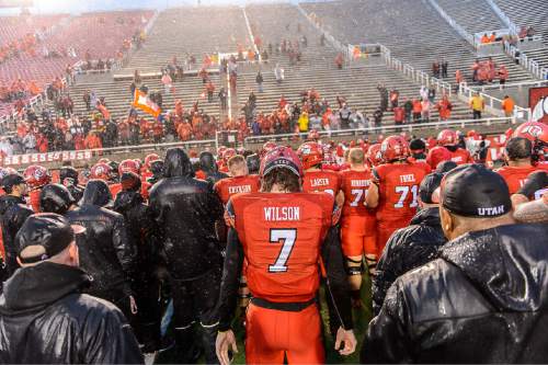 Trent Nelson  |  The Salt Lake Tribune
Utah Utes quarterback Travis Wilson (7) and the team sings "Utah Man" with the few fans who stayed to the bitter end as the University of Utah Utes lose to the Arizona Wildcats, college football at Rice-Eccles Stadium in Salt Lake City Saturday November 22, 2014.