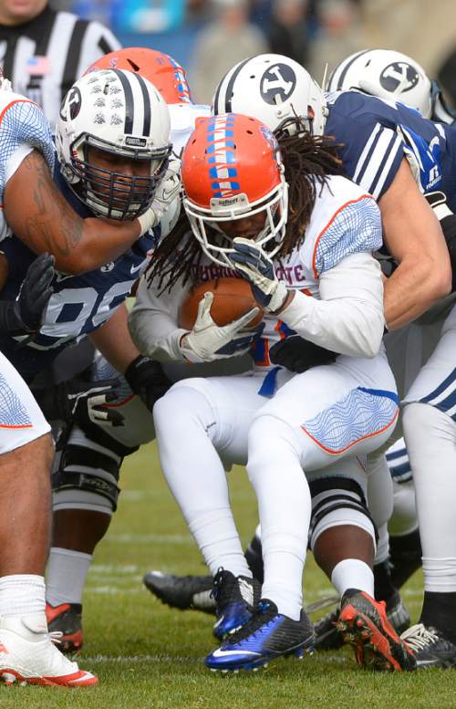 Leah Hogsten  |  The Salt Lake Tribune
The BYU defensive line stops Savannah State Tigers running back Richard Williams II. Brigham Young University leads Savannah State 51-0 at the half, November 22, 2014, at LaVell Edwards Stadium in Provo.