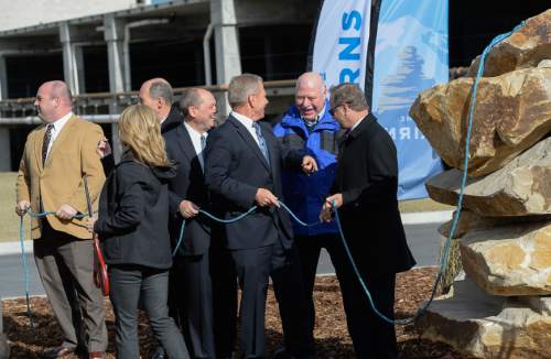 Francisco Kjolseth  |  The Salt Lake Tribune
Sandy officials, including Mayor Tom Dolan, second from right, hold a "climbing rope" cutting event at the site of the future Prestige, a 25-story high-rise residential building in the heart of a new 1,100 acre city center called "The Cairns." The project from 90th S. to 114th S., and I-15 to UTA light rail calls for 20 million square feet of development.