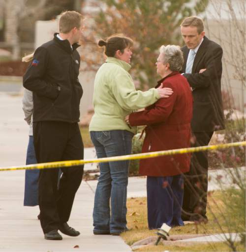 Rick Egan  |  The Salt Lake Tribune

Neighbors and loved ones gather as the police investigate a fatal accidental shooting in the 1900 block of Cooper Street in Kaysville, Sunday, November 23, 2014