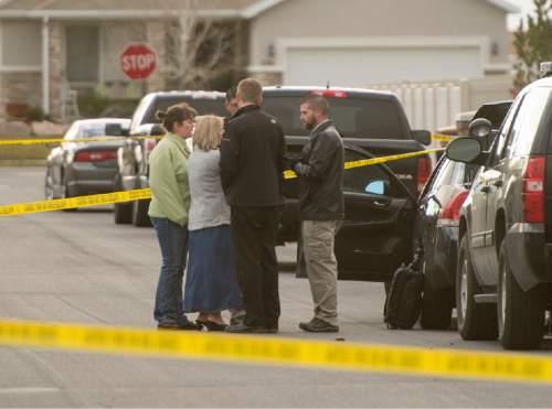 Rick Egan  |  The Salt Lake Tribune

Police investigate a fatal accidental shooting in the 1900 block of Cooper Street in Kaysville, Sunday, November 23, 2014