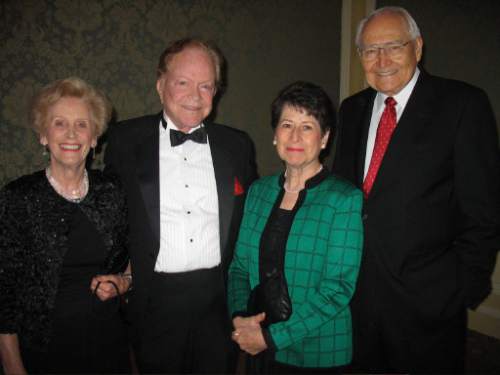 Tribune file photo
 "People of Vision" Beverley and James L. Sorenson, left, with Barbara Perry and LDS Apostle L. Tom Perry at the Friends for Sight 2006 award dinner.