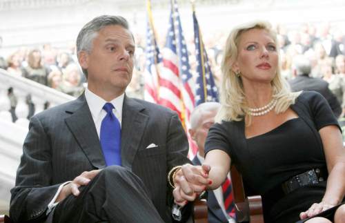 (Tribune file photo)  Jon Huntsman holds the hand of his wife Mary Kaye during Gary Herbert's inauguration as Utah's new governor Aug. 11, 2009,  at the Utah State Capitol in Salt Lake City.  (Keith Johnson, POOL)