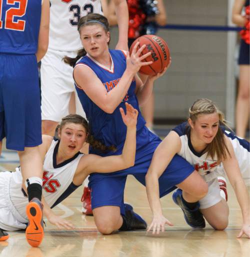 Trent Nelson  |  The Salt Lake Tribune
Timpview's Lacy Haddock grabs the ball in a scramble with Springville's Hannah Packard and Ashli Averett as Springville beats Timpview High School for the 4A girls state basketball championship Saturday, February 23, 2013 in Taylorsville.