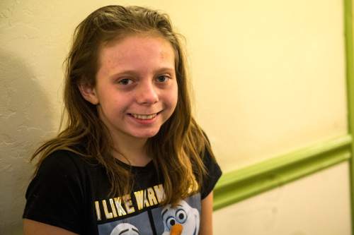 Chris Detrick  |  The Salt Lake Tribune
Rachel Lukasik, 11, who was badly burned in a plane crash near Great Falls, Montana, is staying at the University of Utah Healthcare's new Patient and Family Housing hotel near the airport, 2080 W. North Temple, Wednesday November 26, 2014.