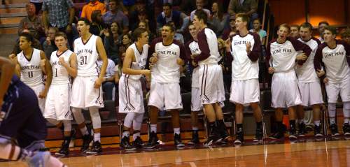 Leah Hogsten  |  The Salt Lake Tribune
Lone Peak players react to the win. Lone Peak High School defeated Layton High School 73-70, Tuesday, November 25, 2014 in Highland.