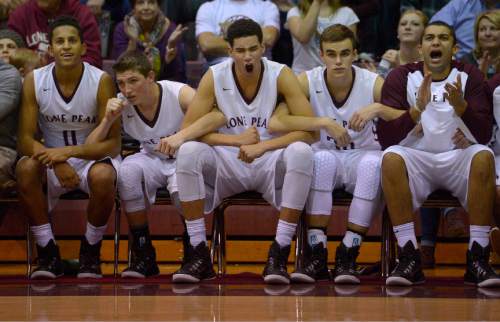 Leah Hogsten  |  The Salt Lake Tribune
Lone Peak players react to the win. Lone Peak High School defeated Layton High School 73-70, Tuesday, November 25, 2014 in Highland.