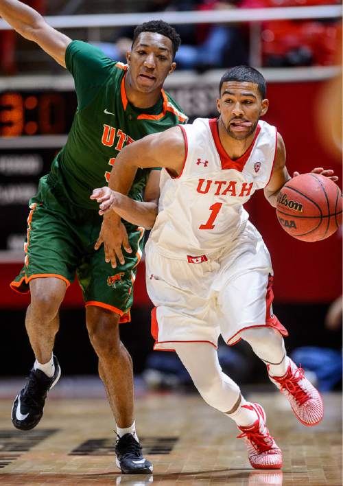 Trent Nelson  |  The Salt Lake Tribune
Utah Utes guard Isaiah Wright (1) is fouled by Texas-Pan American Broncs guard Isaiah Hobbs (3) as the University of Utah Utes host the UT Pan American Broncs, NCAA basketball at the Huntsman Center in Salt Lake City, Wednesday November 26, 2014.