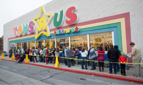 Rick Egan  |  The Salt Lake Tribune

Holiday shoppers wait in front of the Toys R Us in Sugarhouse before it opened at 5:00, Thursday, November 27, 2014