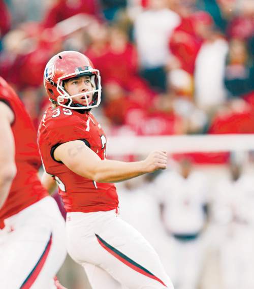 Trent Nelson  |  The Salt Lake Tribune
Utah Utes kicker Andy Phillips (39) scores an extra point as the University of Utah hosts Arizona State, college football at Rice-Eccles Stadium in Salt Lake City, Saturday November 9, 2013.
