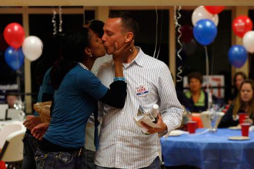 Photo by Chris Detrick  |  Tribune file photo
Mia Love kisses her husband Jason Love at the Avondale Academy on Nov. 3, 2009, during her campaign for Saratoga Springs mayor.