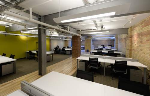 Francisco Kjolseth  |  The Salt Lake Tribune
More than half-dozen business incubators have sprung up in Salt Lake City's downtown in recent years, including Holodeck.  They offer inexpensive `co-working' space, where startup companies share offices, support services to save costs.