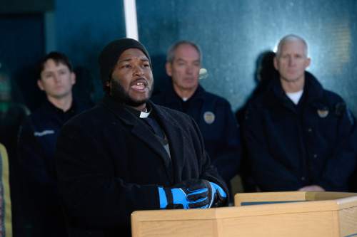 Francisco Kjolseth  |  The Salt Lake Tribune
Pastor Jerrod Lowry joins other community religious leaders along with Salt Lake County Sheriff Jim Winder and Unified Police Department officials in a call for civility and unity after the unrest in Ferguson, Mo. The event was held at the Salt Lake County Sheriff's Office along with a few members of the community on Sunday, Nov. 30, 2014.