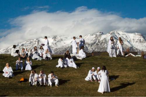Steve Griffin  |  The Salt Lake Tribune

People dressed all in white wait in Rock Canyon Park as they joined 1039 participants in an attempt to break a world record for a living nativity in Provo, Monday, December 1, 2014.
