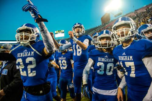 Chris Detrick  |  The Salt Lake Tribune
Members of the Bingham football team celebrate after winning the 5A state championship game at Rice-Eccles Stadium Friday November 21, 2014. Bingham defeated American Fork 20-3.