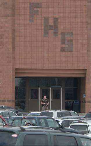 Francisco Kjolseth  |  The Salt Lake Tribune
Fremont High school in Plain City is locked down after reports of a student seen with a gun on Monday, Dec. 1, 2014.