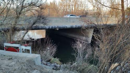Lennie Mahler | The Salt Lake Tribune

West Valley City police discovered a body of unknown age and gender in the Jordan River on Monday Dec. 1, 2014.