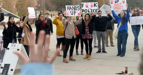 Al Hartmann  |  The Salt Lake Tribune
About 75 University of Utah students rallied in support of Michael Brown and Ferguson protesters at the Marriott Library plaza Monday Dec. 1, 2014. The protest was largely organized via Twitter using the hashtag handsupwalkout. This was part of a nationwide protest.