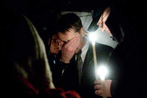 Susan Powell's husband Joshua Powell during a candle light vigil at the Church of Jesus Christ of Latter-day Saints, Ridgecrest Building in Puyallup, Washington Sunday December 20, 2009. Susan Powell has been missing since Dec. 7. Her husband Joshua Powell said he last saw her at 12:30 a.m. that day when he took their two young sons on a camping trip and left Susan Powell at home.  West Valley City police have called Joshua Powell a person of interest and said he has not been forthcoming in two interviews with detectives. 
Photo by Chris Detrick | The Salt Lake Tribune