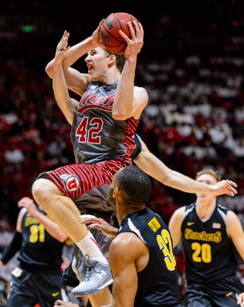 Trent Nelson  |  The Salt Lake Tribune
Utah Utes forward Jakob Poeltl (42) shoots the ball as the University of Utah Utes host the Wichita State Shockers, college basketball at the Huntsman Center in Salt Lake City, Wednesday December 3, 2014.