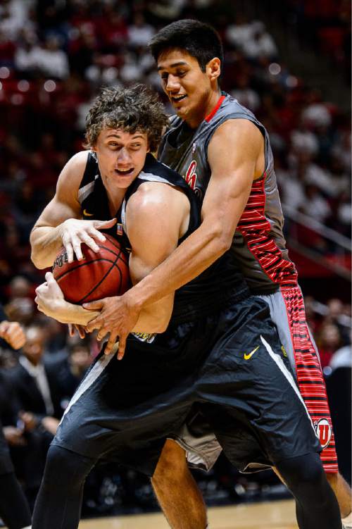 Trent Nelson  |  The Salt Lake Tribune
Utah Utes forward Chris Reyes (20) fouls Wichita State Shockers guard Evan Wessel (3) as the University of Utah Utes host the Wichita State Shockers, college basketball at the Huntsman Center in Salt Lake City, Wednesday December 3, 2014.