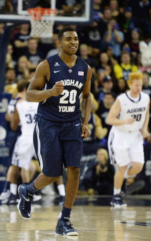 Steve Griffin  |  The Salt Lake Tribune

Brigham Young Cougars guard Anson Winder (20) pumps his fist and smiles after a made a three pointer during second half action in the BYU versus USU men's basketball game in Logan, Tuesday, December 2, 2014.