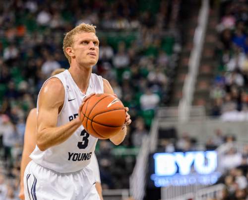 Trent Nelson  |  The Salt Lake Tribune
Brigham Young Cougars guard Tyler Haws (3) shoots a free throw as BYU faces Hawaii, college basketball at EnergySolutions Arena in Salt Lake City, Saturday December 6, 2014.
