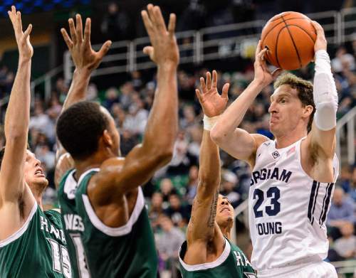 Trent Nelson  |  The Salt Lake Tribune
Brigham Young Cougars guard Skyler Halford (23) faces a row of Hawaii defenders as BYU faces Hawaii, college basketball at EnergySolutions Arena in Salt Lake City, Saturday December 6, 2014.