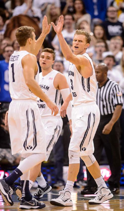 Trent Nelson  |  The Salt Lake Tribune
Brigham Young Cougars guard Tyler Haws (3) high-fives Chase Fischer (1) as BYU faces Hawaii, college basketball at EnergySolutions Arena in Salt Lake City, Saturday December 6, 2014.