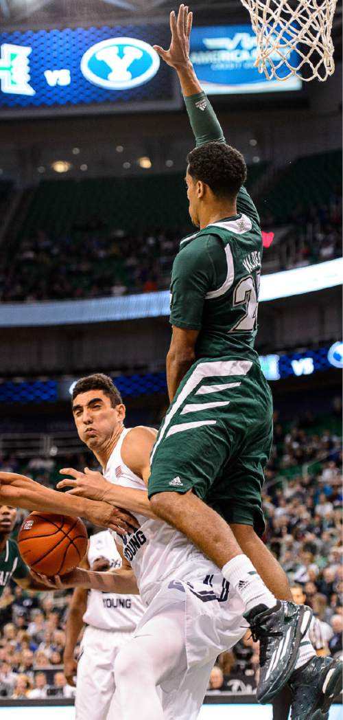 Trent Nelson  |  The Salt Lake Tribune
Hawaii Warriors guard Aaron Valdes (23) defends Brigham Young Cougars center Corbin Kaufusi (44) as BYU faces Hawaii, college basketball at EnergySolutions Arena in Salt Lake City, Saturday December 6, 2014.