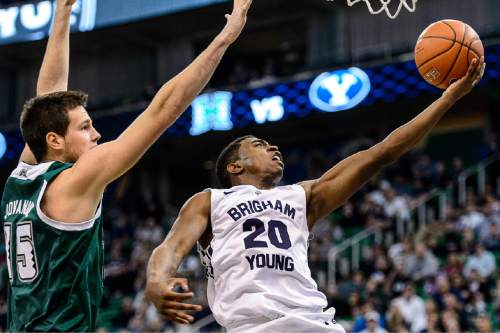 Trent Nelson  |  The Salt Lake Tribune
Brigham Young Cougars guard Anson Winder (20) shoots the ball as BYU faces Hawaii, college basketball at EnergySolutions Arena in Salt Lake City, Saturday December 6, 2014.