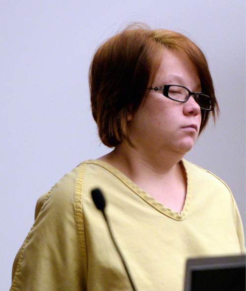 Al Hartmann  |  The Salt Lake Tribune
Alicia Englert, accused of throwing her baby in the trash earlier this month, makes her initial appearance in Judge Ann Boyden's courtroom in Salt Lake City Wednesday Septmeber 10.  She is charged with attempted murder.