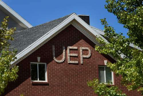 Scott Sommerdorf   |  The Salt Lake Tribune
A home in Hildale, Utah, is adorned last year with bricks spelling out UEP.