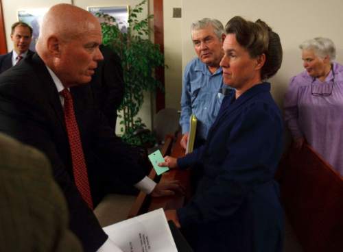 Trent Nelson  |  Tribune file photo 

FLDS member Mary Harker, right, speaks with UEP trust administrator Bruce Wisan following a 2009 court hearing.