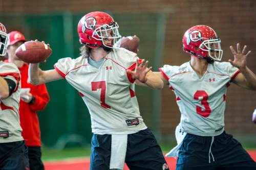 Chris Detrick  |  The Salt Lake Tribune
Utah quarterbacks Travis Wilson and Jason Thompson throw the ball during a practice at Spence and Cleone Eccles Football Center Thursday March 20, 2014.