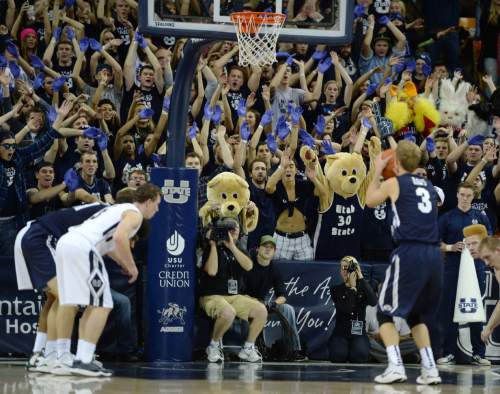Steve Griffin  |  The Salt Lake Tribune

The Utah State student section gets crazy as Brigham Young Cougars guard Tyler Haws (3) shoots free throws during second half action in the BYU versus USU men's basketball game in Logan, Tuesday, December 2, 2014.
