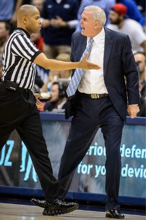 Trent Nelson  |  The Salt Lake Tribune
Brigham Young Cougars head coach Dave Rose argues a call with an official as BYU hosts Utah, college basketball at the Marriott Center in Provo, Wednesday December 10, 2014.