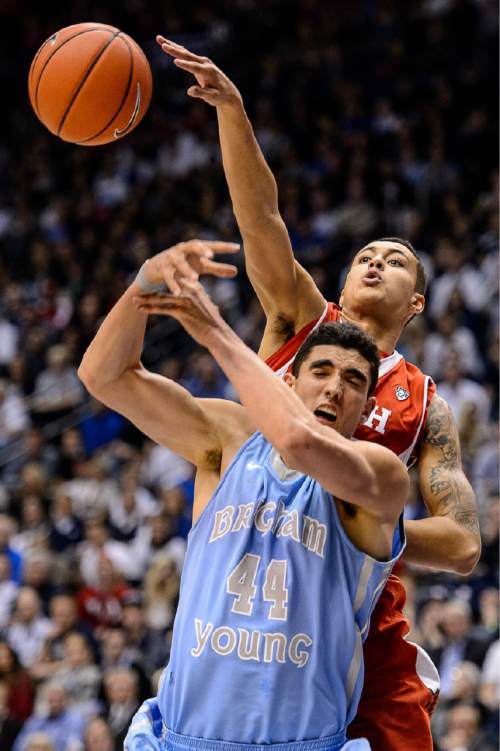 Trent Nelson  |  The Salt Lake Tribune
Utah Utes forward Kyle Kuzma (35) defends Brigham Young Cougars center Corbin Kaufusi (44) as BYU hosts Utah, college basketball at the Marriott Center in Provo, Wednesday December 10, 2014.