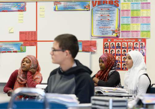 Steve Griffin  |  The Salt Lake Tribune

Students in Dayra Gaitan's ninth grade ESL class at Granite Park Jr. High School listen to Gov. Gary Herbert as he talks with the class following announcement of the fiscal year 2016 budget proposal in Salt Lake City, Thursday, December 11, 2014.