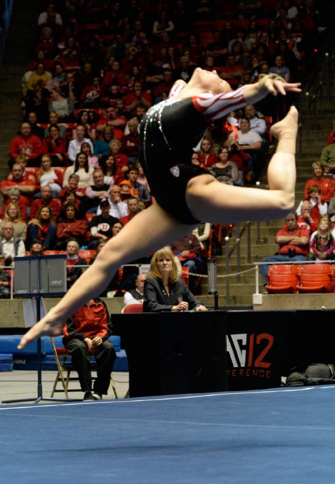 Rick Egan  | The Salt Lake Tribune 

Becky Tutka performs on the floor for the Utes, in gymnastics action, Utah vs. Oregon State, at the Huntsman Center, Saturday, February 22, 2014.