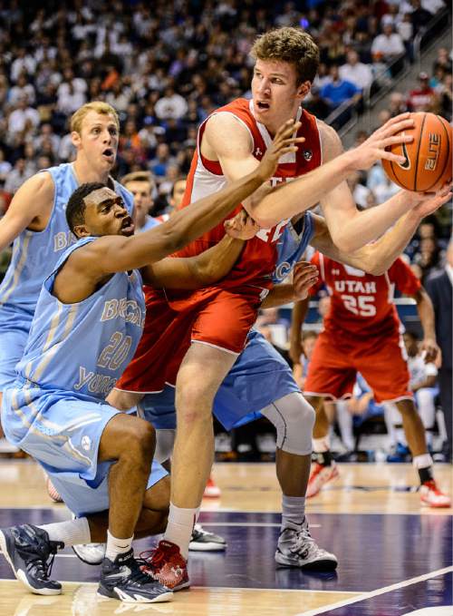 Trent Nelson  |  The Salt Lake Tribune
Utah Utes forward Jakob Poeltl (42) is defended by Brigham Young Cougars guard Anson Winder (20), as BYU hosts Utah, college basketball at the Marriott Center in Provo, Wednesday December 10, 2014.