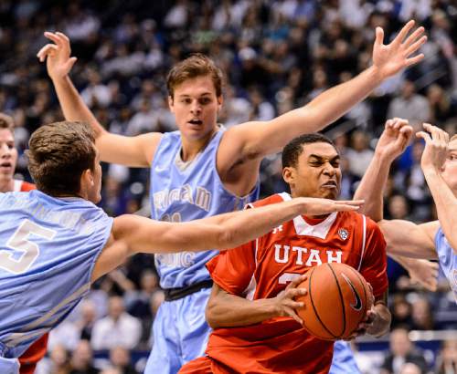 Trent Nelson  |  The Salt Lake Tribune
Utah Utes guard Kenneth Ogbe (25) drives to the basket as BYU hosts Utah, college basketball at the Marriott Center in Provo, Wednesday December 10, 2014.